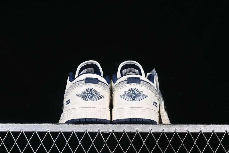 Nike Air Jordan 1 Low Supreme Blue Sole White Sneakers