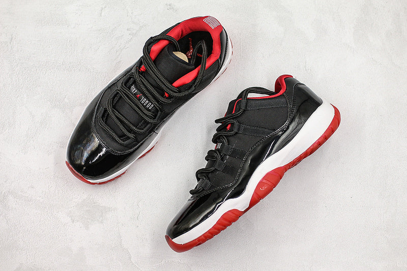 Nike Air Jordan 11 Retro Low-Top Bred Black Sneakers