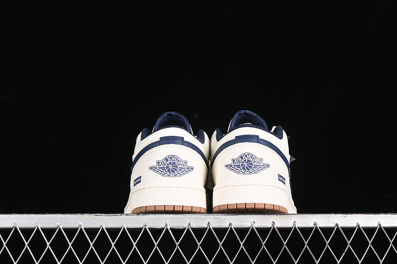 Nike Air Jordan 1 Low Supreme Navy White Sneakers