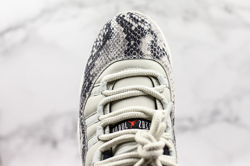 Nike Air Jordan 11 Retro Low-Top "Light Bone" Snakeskin White Sneakers