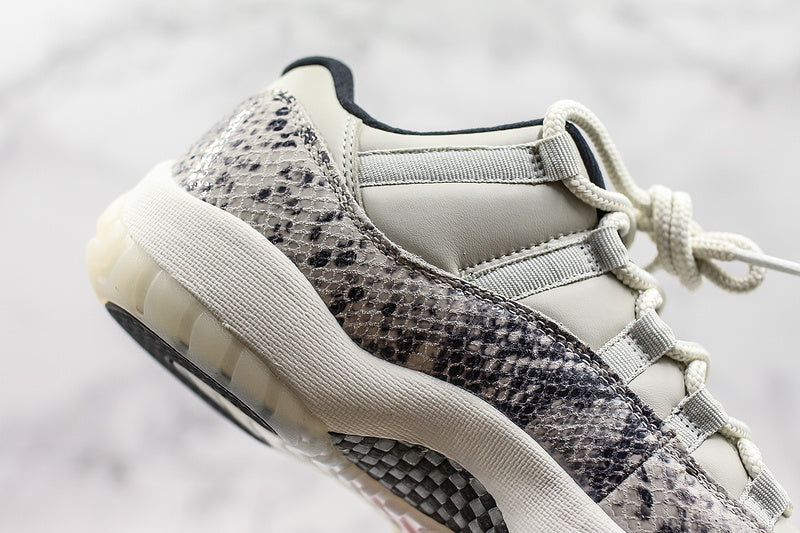 Nike Air Jordan 11 Retro Low-Top "Light Bone" Snakeskin White Sneakers