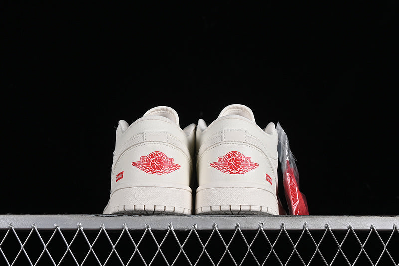 Nike Air Jordan 1 Low Supreme White Sneakers