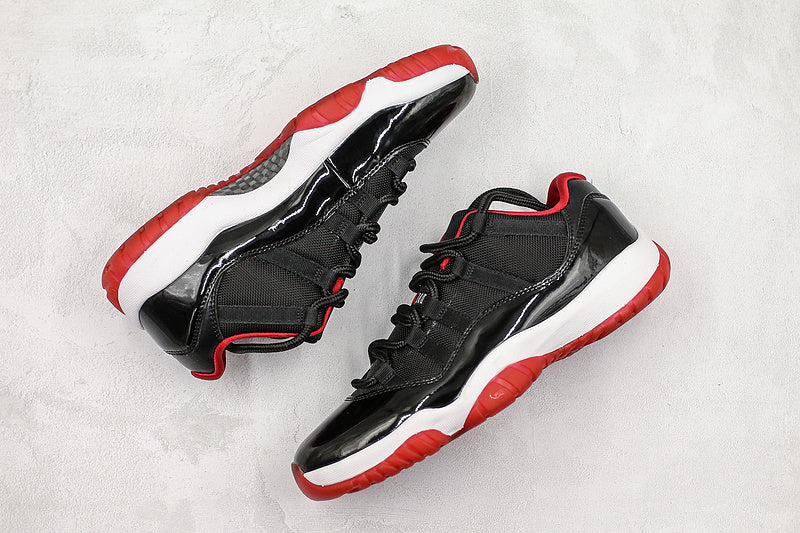 Nike Air Jordan 11 Retro Low-Top Bred Black Sneakers