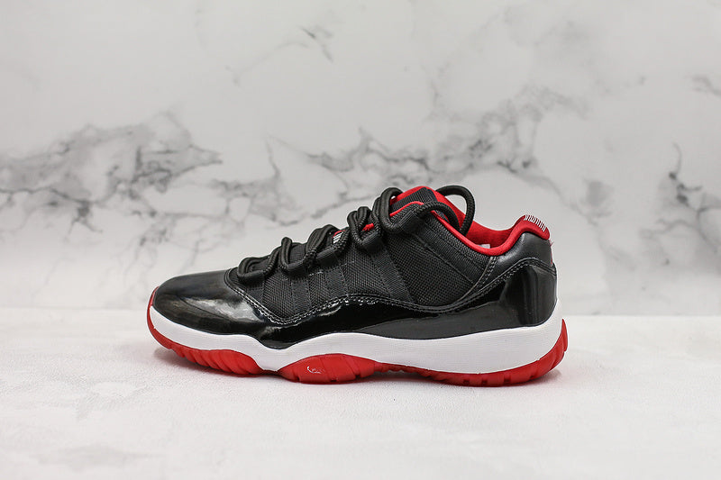Nike Air Jordan 11 Retro Low-Top Bred Black Sneakers