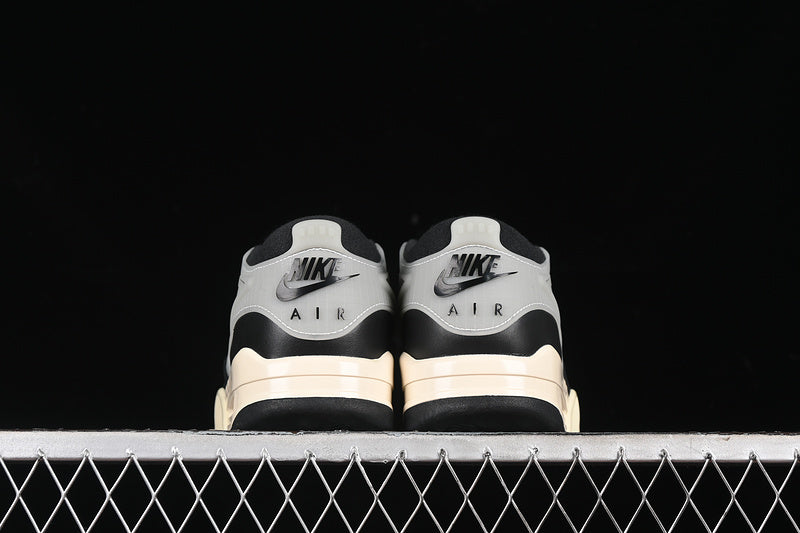 Nike Air Jordan 4 Remastered Black Sail Coconut Milk Sneakers