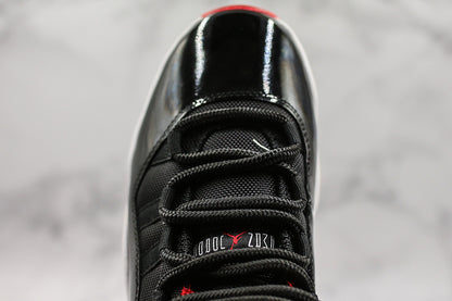 Nike Air Jordan 11 Retro Low-Top Bred Black Sneakers