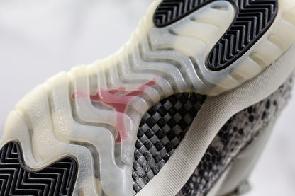 Nike Air Jordan 11 Retro Low-Top "Light Bone" Snakeskin White Sneakers