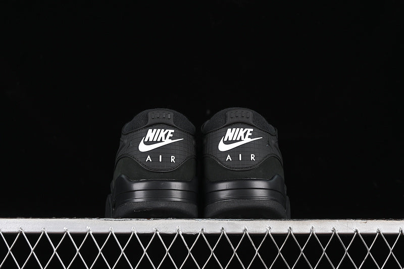 Nike Air Jordan 4 Remastered Pure Black Sneakers
